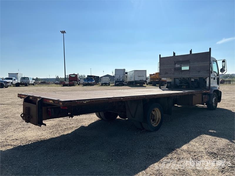 GMC T6500 4x2 Flatbed Truck (Inoperable) Plošinové nákladné automobily/nákladné automobily so sklápacími bočnicami