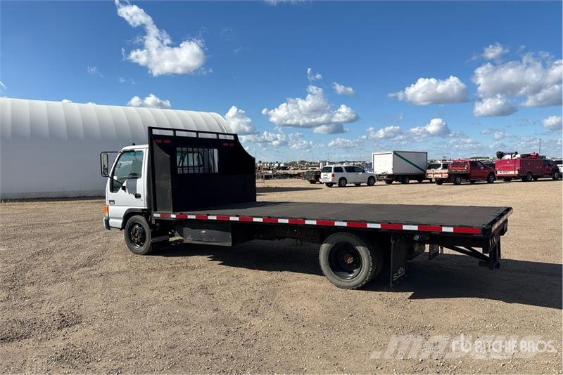 GMC W5500 Tovornjaki s kesonom/platojem