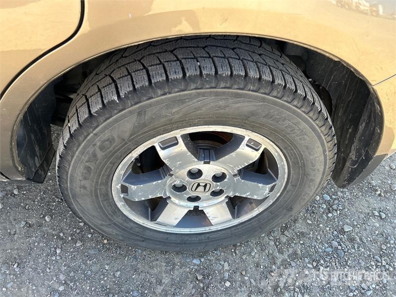 Honda Pilot Avtomobili