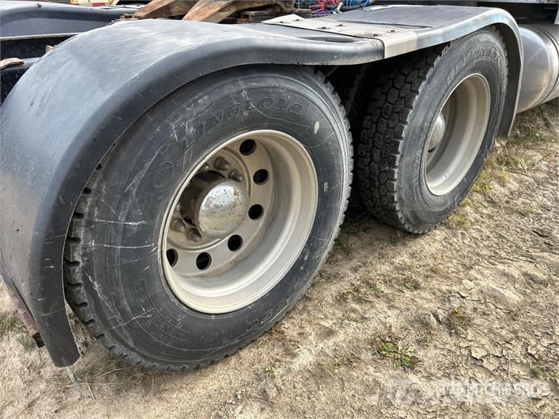 International 9900i 6x4 T/A Sleeper Truck Tractor Trekkers