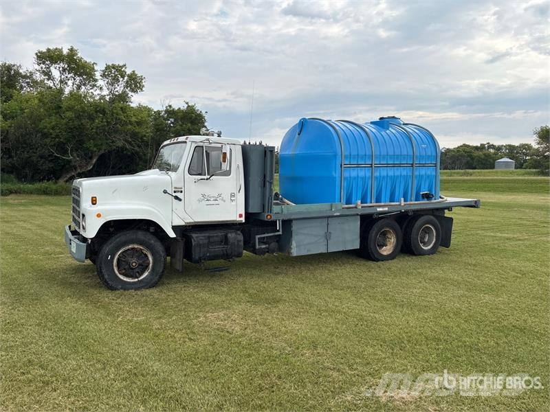 International S2500 6x4 Water Flatbed Truck شاحنات مسطحة/مفصلية الجوانب