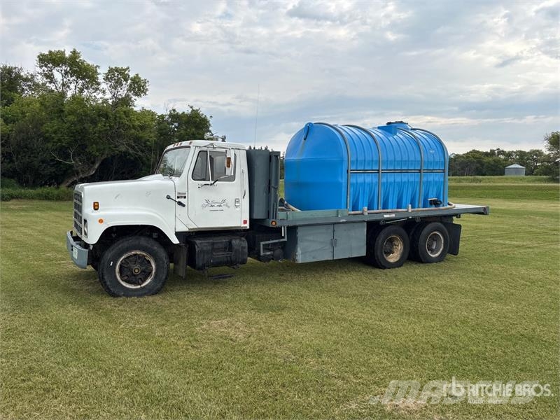 International S2500 6x4 Water Flatbed Truck شاحنات مسطحة/مفصلية الجوانب