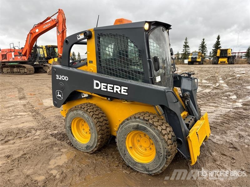 John Deere 320D Kompaktrakodók