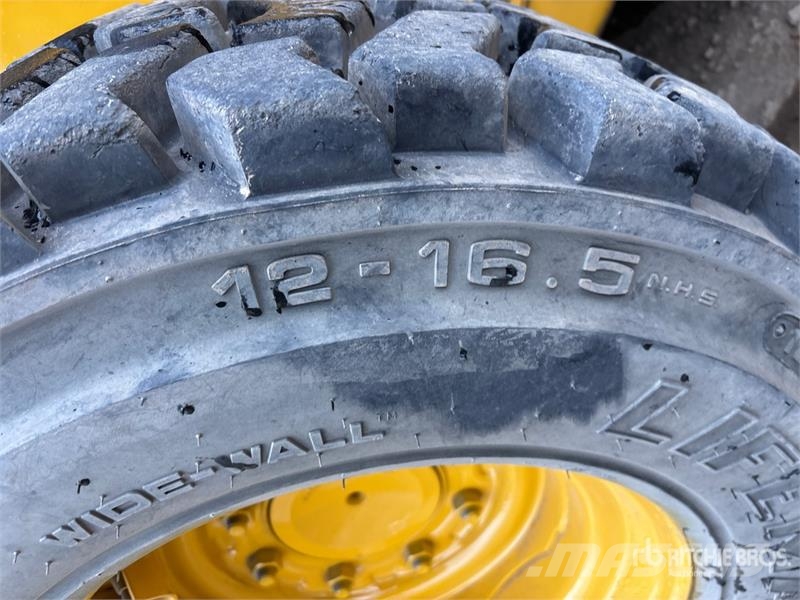 John Deere 320D Kompaktrakodók