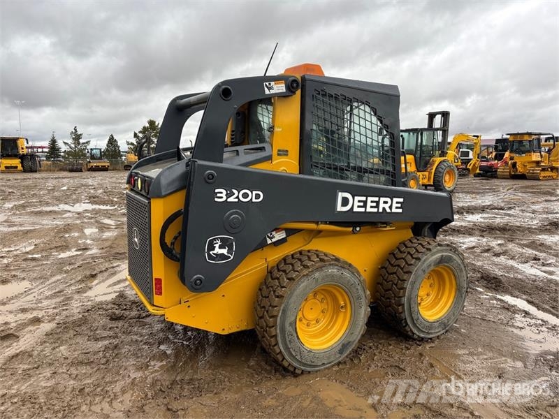 John Deere 320D Kompaktrakodók