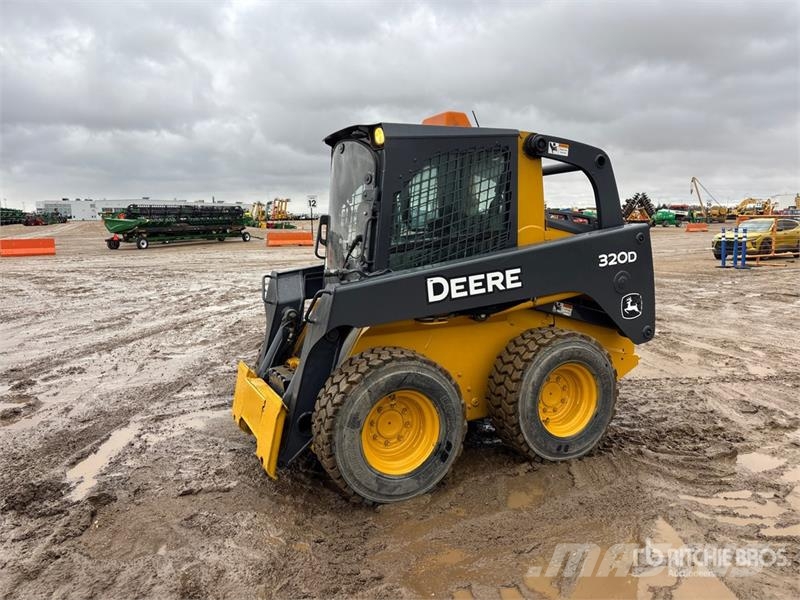 John Deere 320D Kompaktrakodók