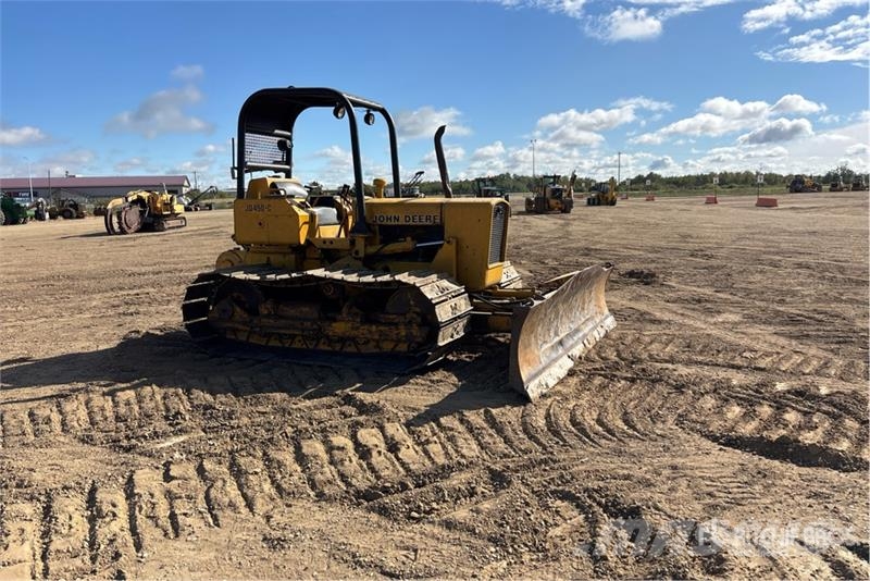 John Deere 450 Buldožeri guseničari