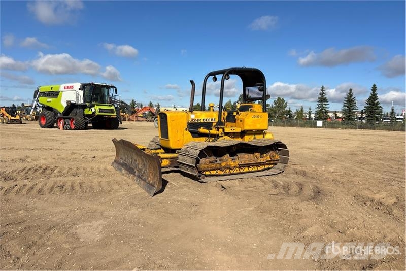 John Deere 450 Buldožeri guseničari