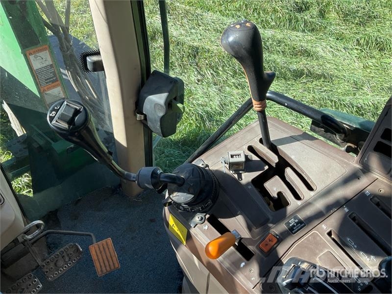 John Deere 6420 الجرارات