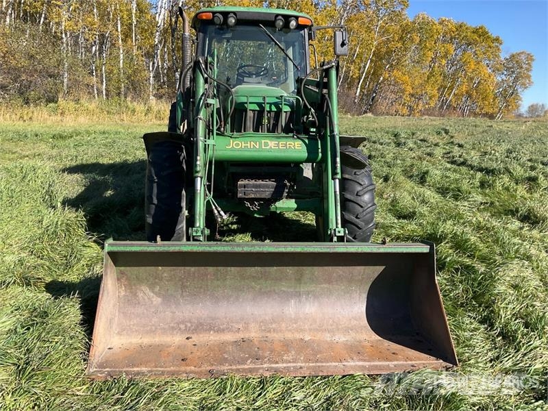 John Deere 6420 الجرارات