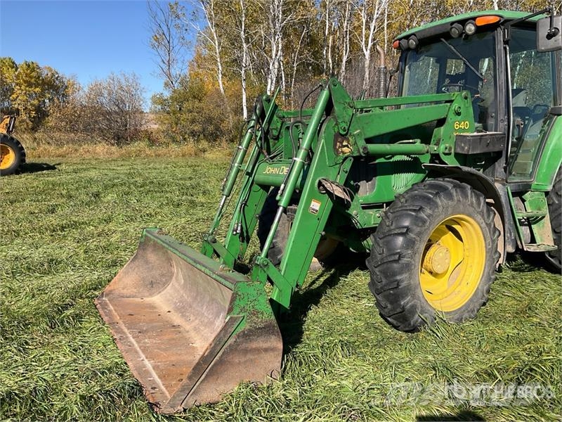 John Deere 6420 الجرارات
