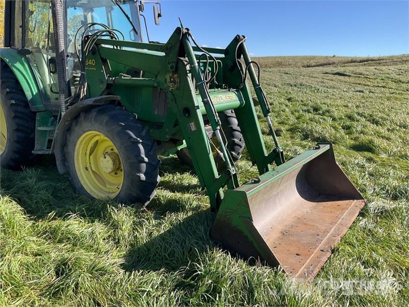 John Deere 6420 الجرارات