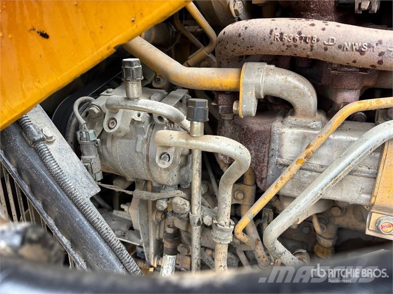 John Deere 710L 4x4 Backhoe Loader Екскаватори-навантажувачі