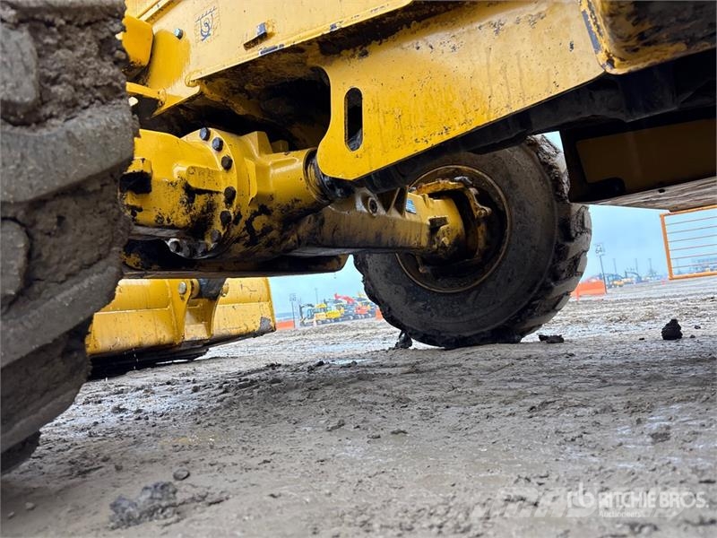 John Deere 710L 4x4 Backhoe Loader Екскаватори-навантажувачі