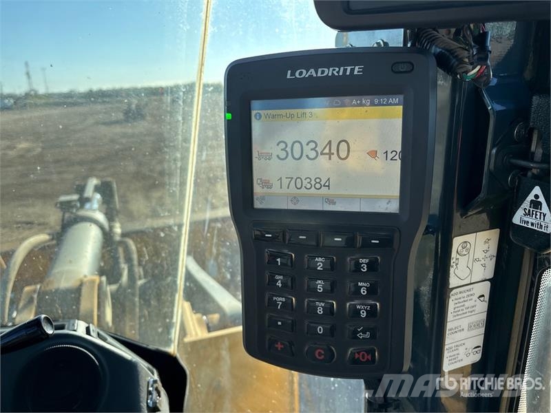 John Deere 724K Pale gommate