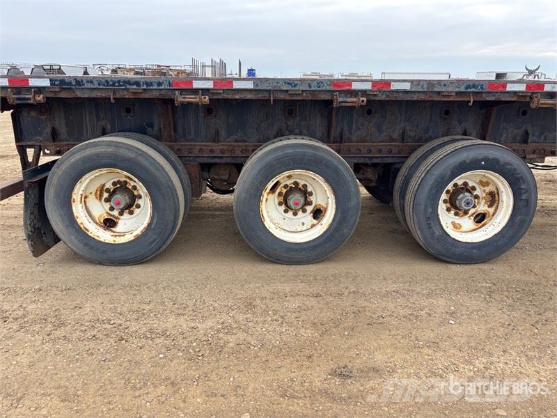 Manac Tri/A 53 ft Extendable Flatbed Trailer Причепи-платформи/бокове розвантаження