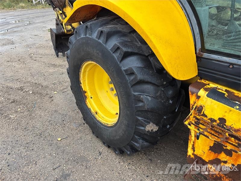 New Holland LB75B لوادر ذات جرافات عكسية