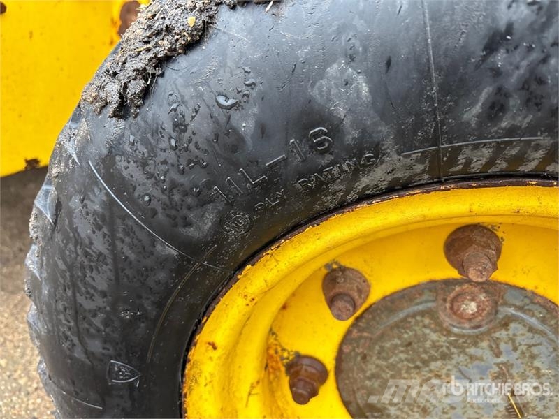 New Holland LB75B لوادر ذات جرافات عكسية