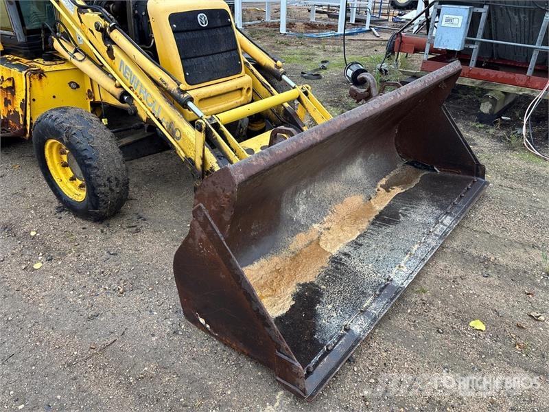 New Holland LB75B لوادر ذات جرافات عكسية