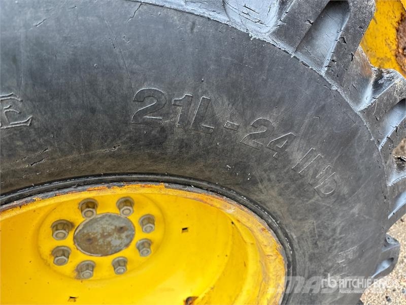 New Holland LB75B لوادر ذات جرافات عكسية