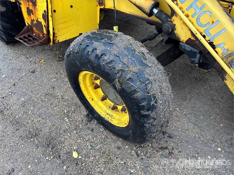 New Holland LB75B لوادر ذات جرافات عكسية