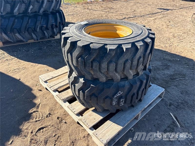  Quantity of (2) Carlisle 14x17.5 Foam Filled Tires Riepas, riteņi un diski