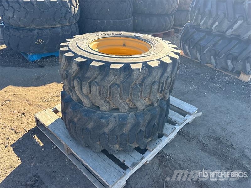  Quantity of (2) Carlisle 14x17.5 Foam Filled Tires Riepas, riteņi un diski