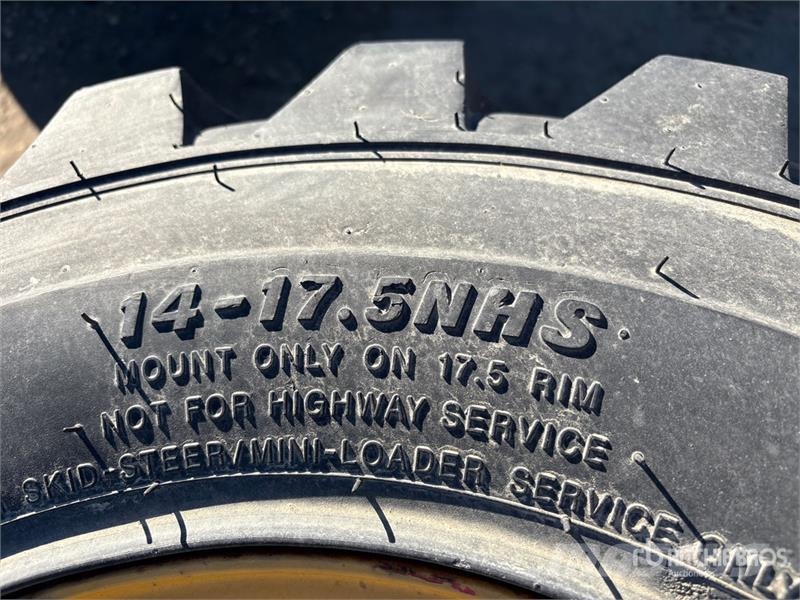  Quantity of (2) Carlisle 14x17.5 Foam Filled Tires Riepas, riteņi un diski