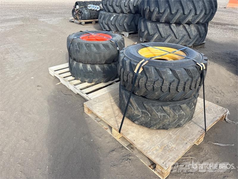 Quantity of (4) 12-16.5 Tires الإطارات والعجلات والحافات