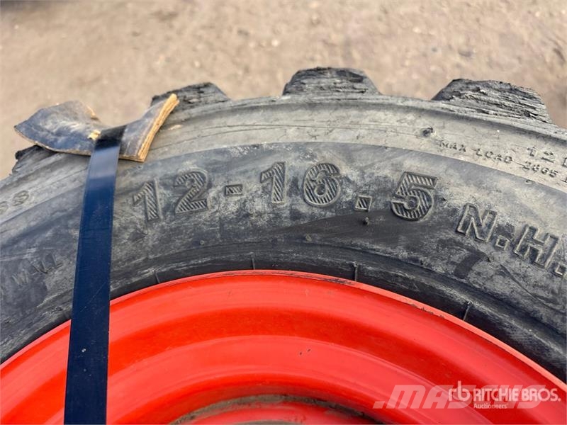 Quantity of (4) 12-16.5 Tires الإطارات والعجلات والحافات