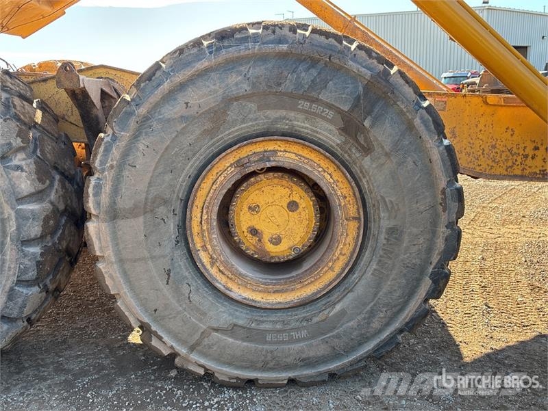 John Deere 400D Зчленовані самоскиди