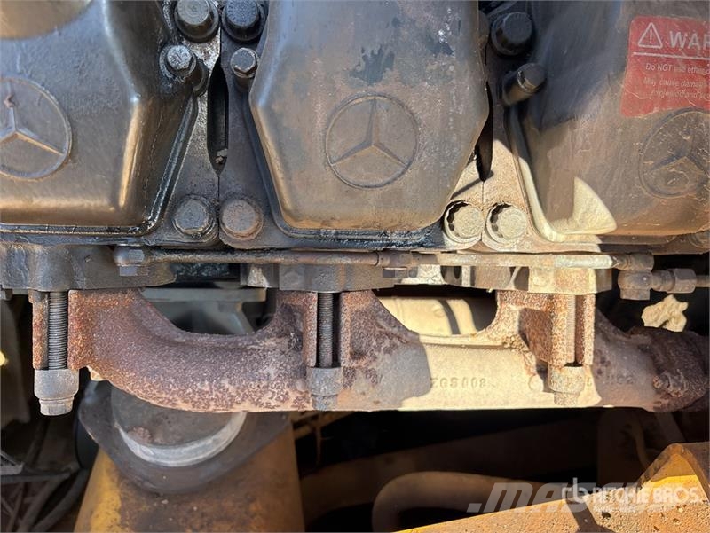 John Deere 400D Зчленовані самоскиди