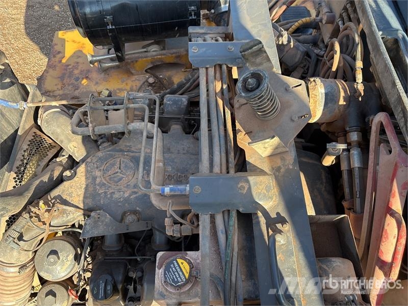 John Deere 400D Зчленовані самоскиди
