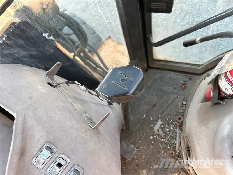 CASE 580 Super M Series 2 لوادر ذات جرافات عكسية