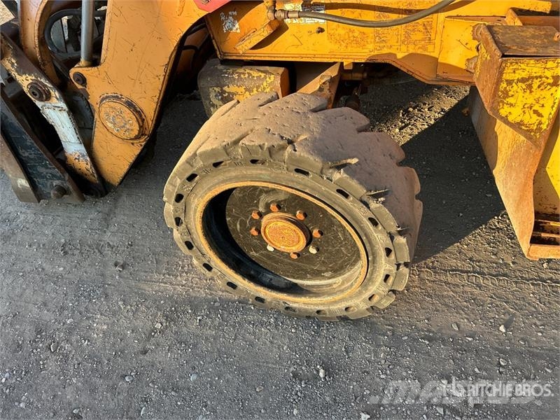CASE 580 Super M Series 2 لوادر ذات جرافات عكسية
