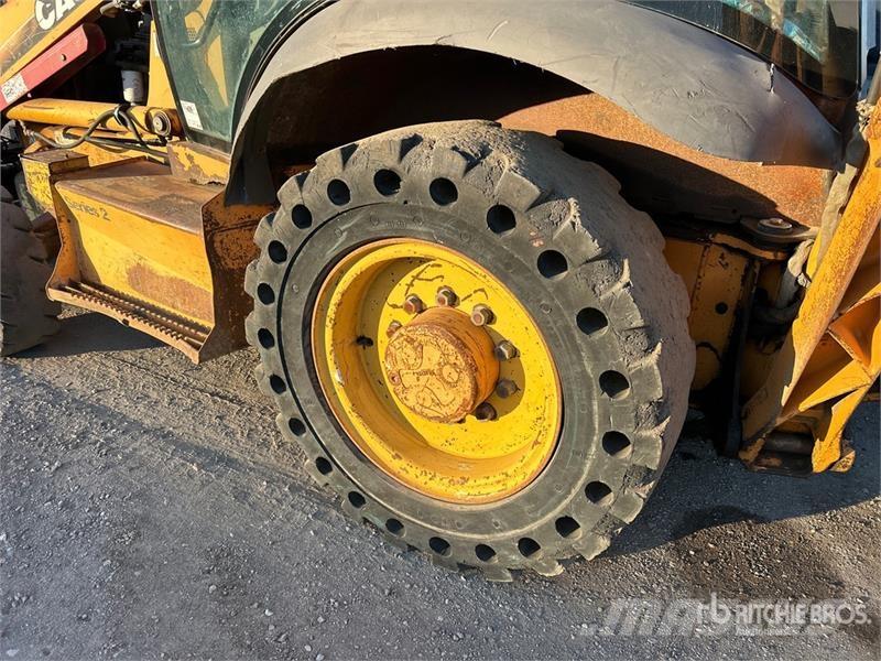 CASE 580 Super M Series 2 لوادر ذات جرافات عكسية