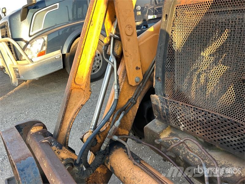 CASE 580 Super M Series 2 لوادر ذات جرافات عكسية