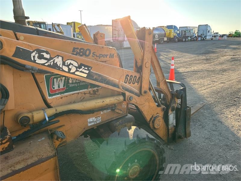 CASE 580 Super M Series 2 لوادر ذات جرافات عكسية