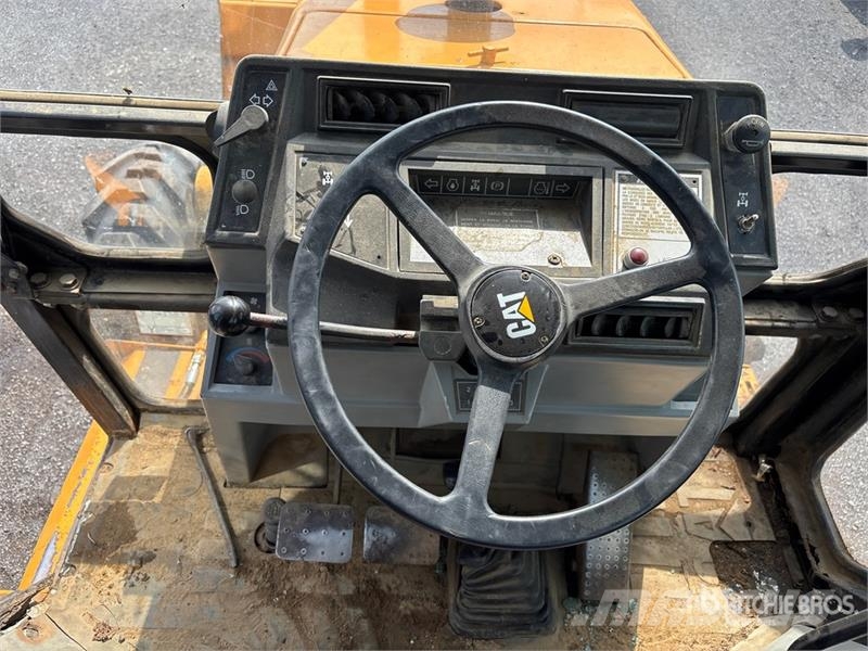 CAT 416E Екскаватори-навантажувачі