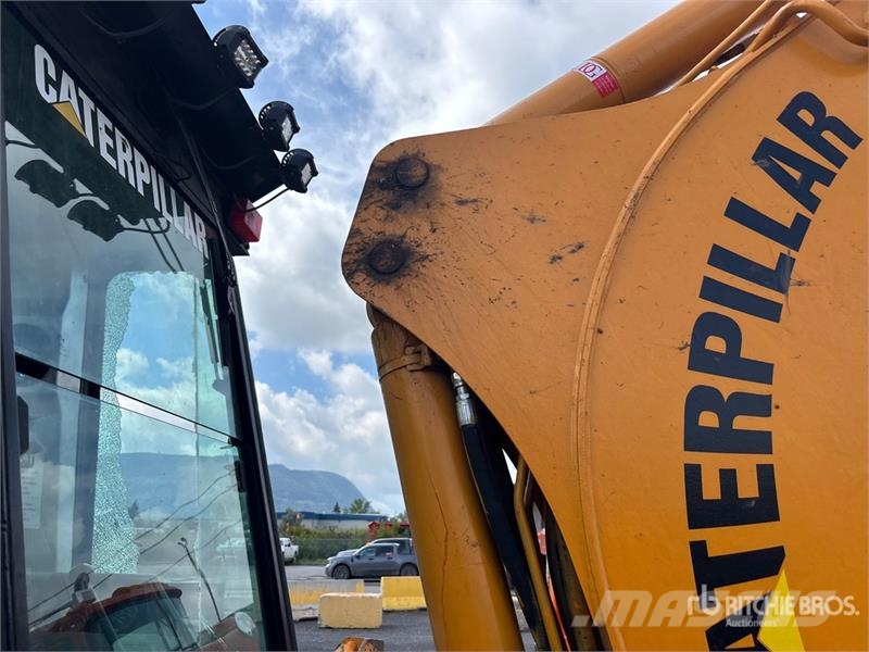 CAT 416E Екскаватори-навантажувачі