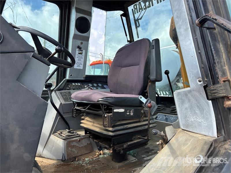 CAT 416E Екскаватори-навантажувачі