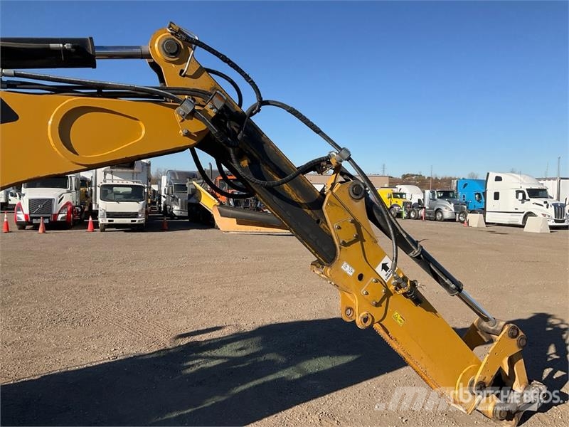 CAT 420E IT لوادر ذات جرافات عكسية