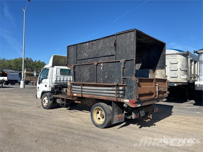 GMC W5500 شاحنات نقل ألواح الخشب