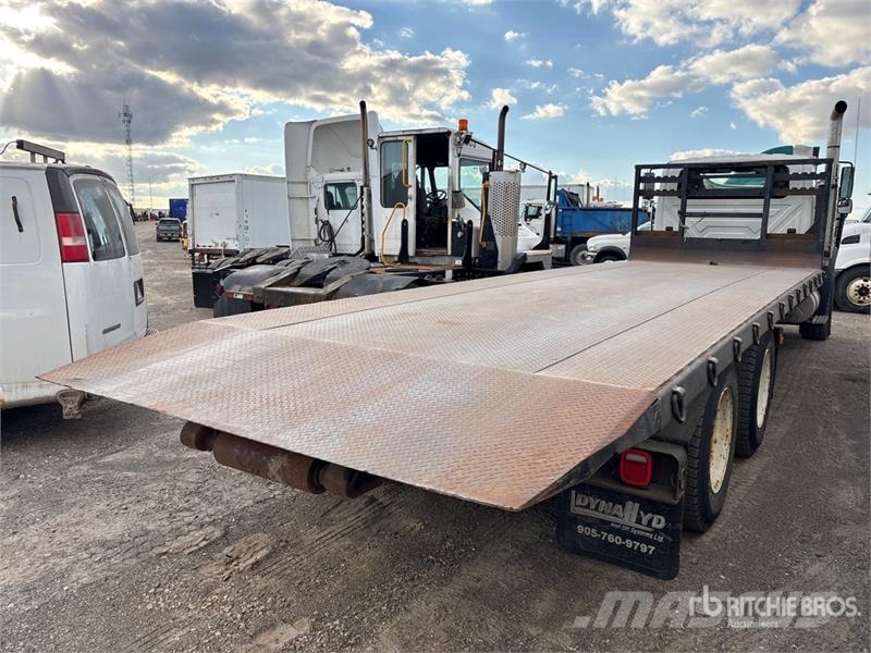 International 7600 Camiones portacubetas