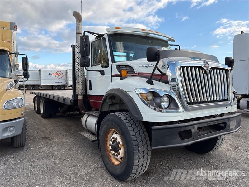 International 7600 Camiones portacubetas