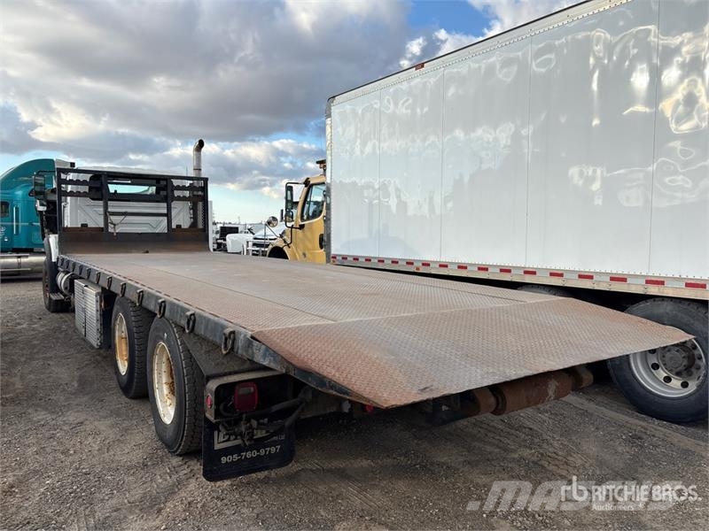 International 7600 Camiones portacubetas