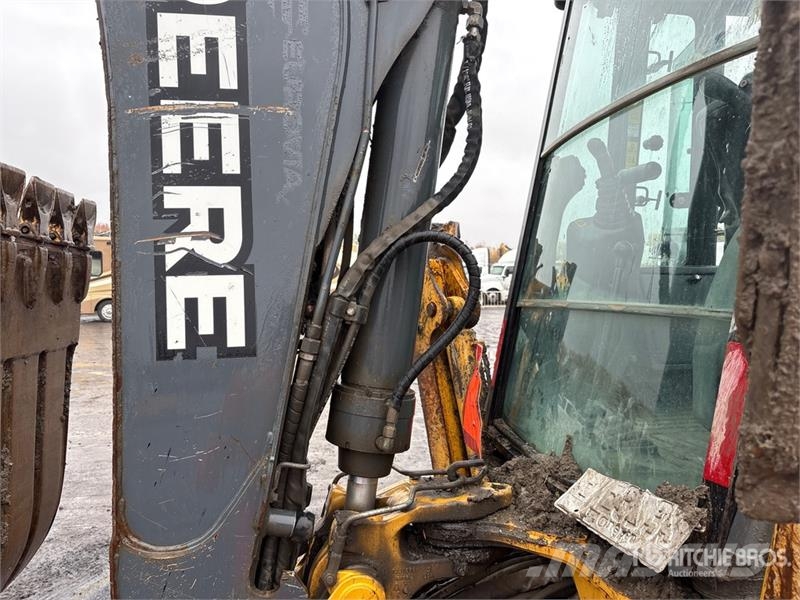John Deere 410L TLB's