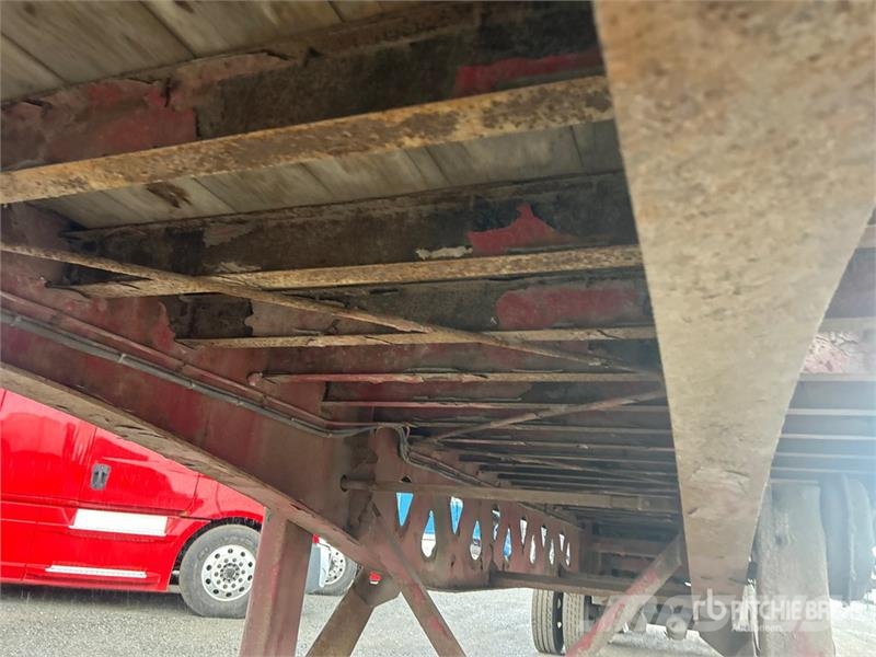 Manac 48 ft Tri/A Flatbed Trailer Rimorchi con sponde ribaltabili