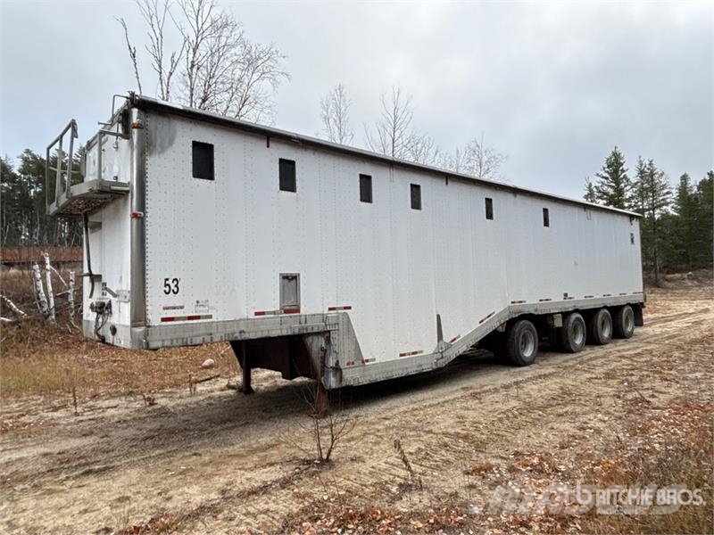 Manac 53 ft Quad/A Open-Top Chip Trailer مقطورات لتقل ألواح الخشب