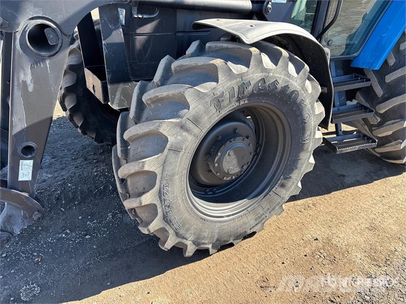 New Holland TS110 الجرارات